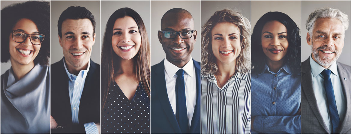 Headshots of seven business people