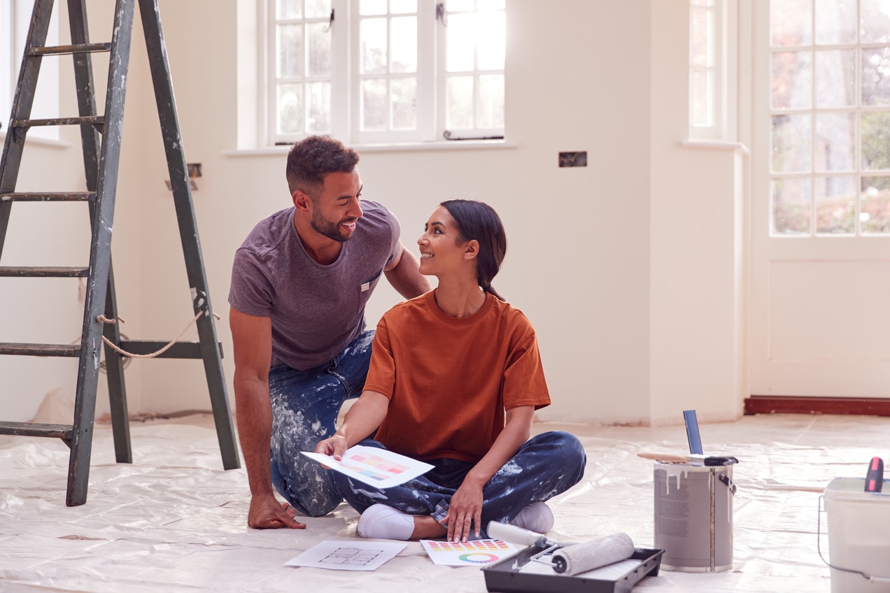 Couple making home improvements after doing a cash-out refinance
